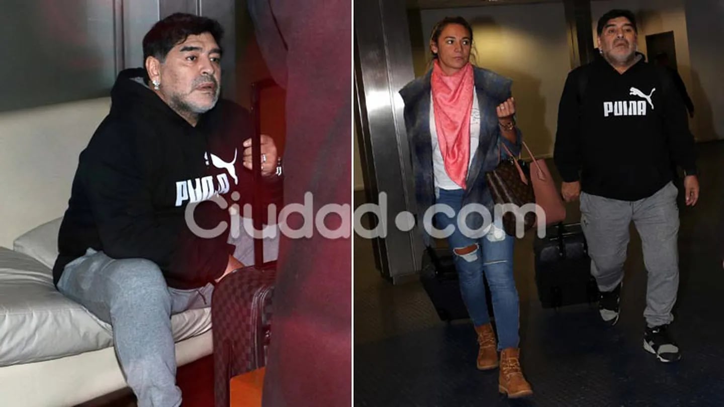 Diego Maradona, en Ezeiza junto a Rocío Oliva. No pudo viajar porque su pasaporte figuraba denunciado por robo. (Fotos: Movilpress)