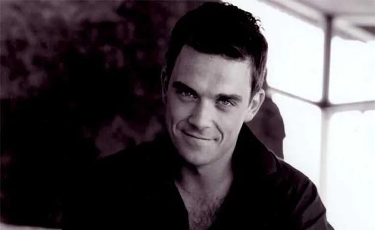 Robbie Williams quiere comprar una isla pare detectar Ovnis. (Foto: Web)