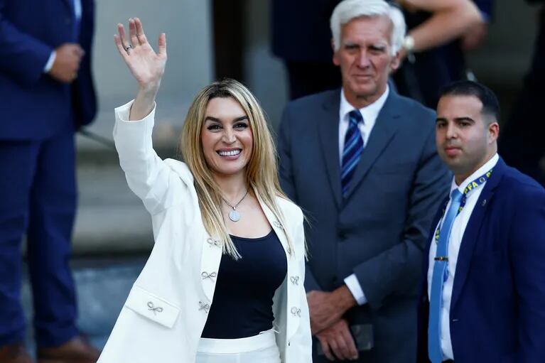 Fatima Florez, partner of  Argentina's President Javier Milei, waves as she arrives to the Metropolitan Cathedral to attend a Te Deum on the day of his inauguration, in Buenos Aires, Argentina December 10, 2023. REUTERS/Cristina Sille