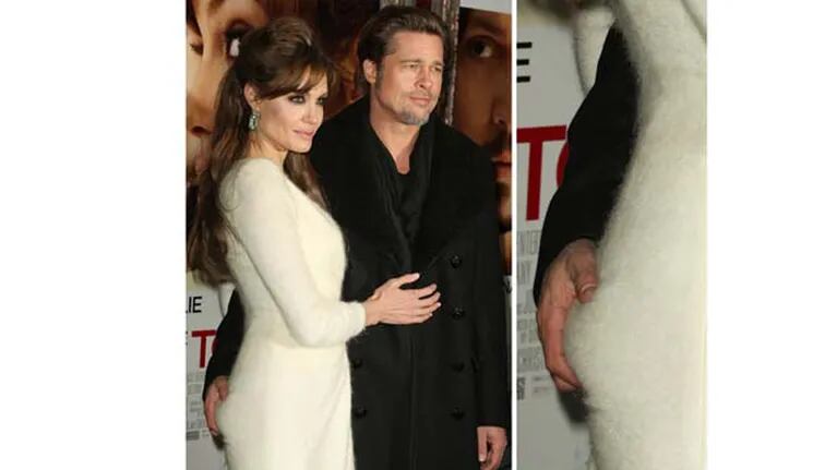 Brad Pitt le toca la cola a Angelina Jolie en público