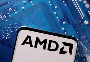 FILE PHOTO: A smartphone with a displayed AMD logo is placed on a computer motherboard in this illustration taken March 6, 2023. REUTERS/Dado Ruvic/Illustration/File Photo