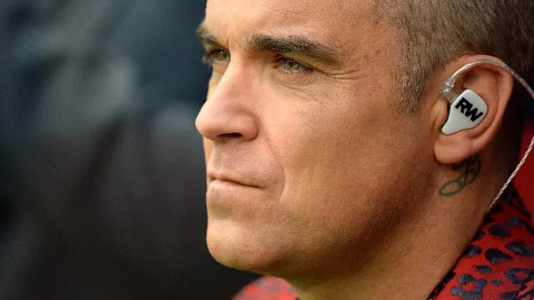 Una película de terror: Robbie Williams contó que casi lo decapitan en Haití. Foto: EFE.