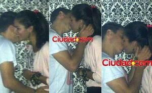 Clarisa y Ezequiel, a los besos en una disco porteña. (Fotos: Ciudad.com)