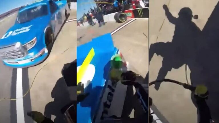  ¡Casi! un mecánico de boxes se cruza de bruces con un coche en la NASCAR