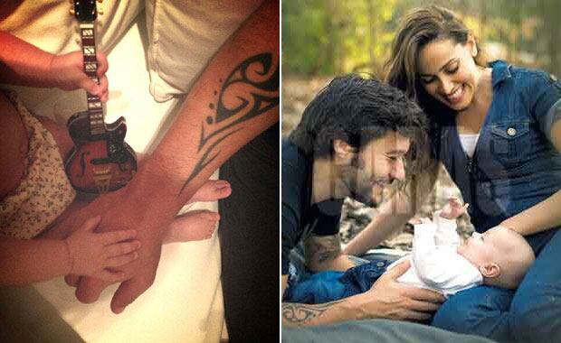 Diego Torres y una dulce "charla" con Nina (Fotos: Twitter).