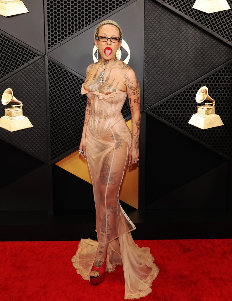 Doja Cat poses on the red carpet as she attends the 66th Annual Grammy Awards in Los Angeles, California, U.S., February 4, 2024. REUTERS/Mario Anzuoni