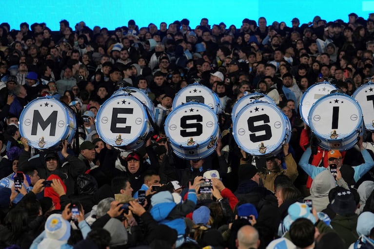 Fans of Argentina display drums with the name of Lionel Messi prior to a World Cup 2026 qualifying soccer match between Argentina and Venezuela at the Monumental stadium in Buenos Aires, Argentina, Thursday, Sept. 4, 2025. (AP Photo/Gustavo Garello)