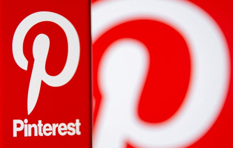 FILE PHOTO: A Pinterest logo is seen on a smartphone in this illustration taken October 20, 2021. REUTERS/Dado Ruvic/Illustration/File Photo