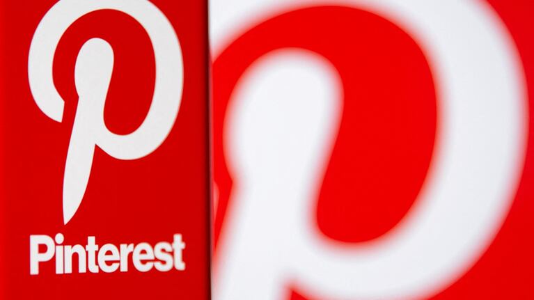 FILE PHOTO: A Pinterest logo is seen on a smartphone in this illustration taken October 20, 2021. REUTERS/Dado Ruvic/Illustration/File Photo