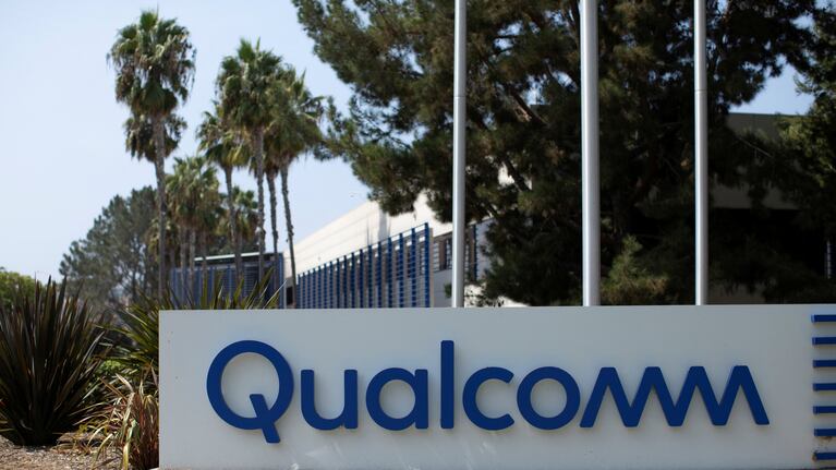 FILE PHOTO: A Qualcomm sign is shown outside one of the company's many buildings in San Diego, California, U.S., September 17, 2020. REUTERS/Mike Blake/File Photo