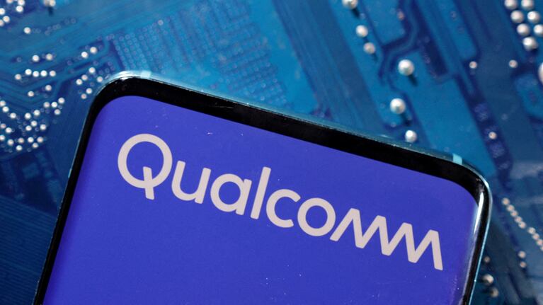 FILE PHOTO: A smartphone with a displayed Qualcomm logo is placed on a computer motherboard in this illustration taken March 6, 2023. REUTERS/Dado Ruvic/Illustration/File Photo