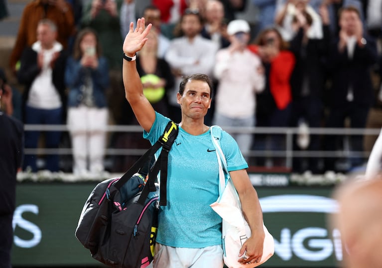 FILE PHOTO: Tennis - French Open - Roland Garros, Paris, France - May 27, 2024 Spain's Rafael Nadal waves to the crowd as he leaves the court after losing his first round match against Germany's Alexander Zverev REUTERS/Yves Herman/File Photo