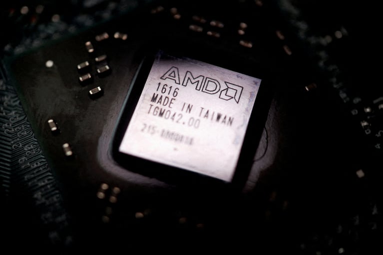 FILE PHOTO: The logo of semiconductor company Advanced Micro Devices Inc (AMD) is seen on a graphics processing unit (GPU) chip in this illustration picture taken February 17, 2023. REUTERS/Florence Lo/Illustration/File Photo