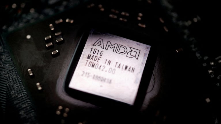FILE PHOTO: The logo of semiconductor company Advanced Micro Devices Inc (AMD) is seen on a graphics processing unit (GPU) chip in this illustration picture taken February 17, 2023. REUTERS/Florence Lo/Illustration/File Photo