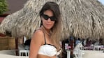 De vacaciones junto a Fernando Burlando y su hija Sarah, la modelo compartió un video desopilante en bikini mientras bailaba con un inflable en las playas blancas del Caribe