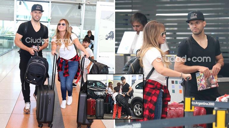 Karina "La Princesita" Tejeda y Sergio "Kun" Agüero, juntos con Benjamín en el Aeropuerto de Ezeiza. Foto: Movil Press - Ciudad.com