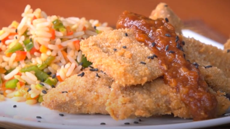 La receta para preparar milanesas de cerdo con un ingrediente estrella. Foto: Cucinare.TV.