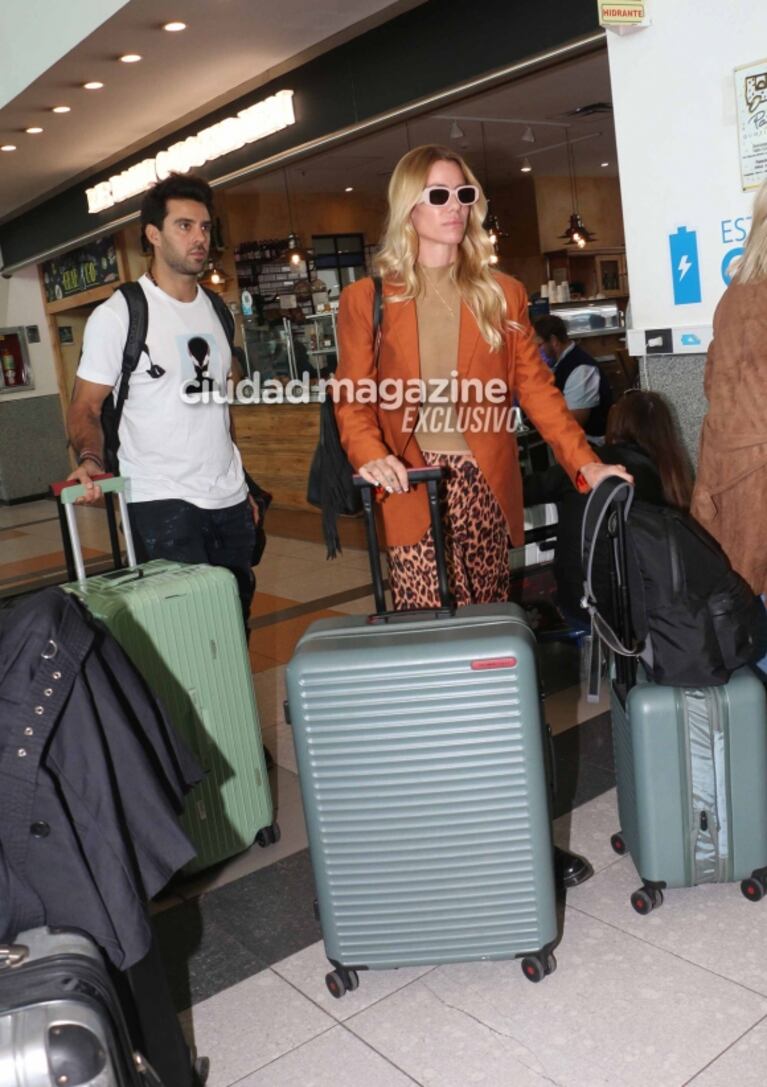 Las fotos de Nicole Neumann y Manu Urcera, mimosos antes de volar a Italia tras el accidente del automovilista