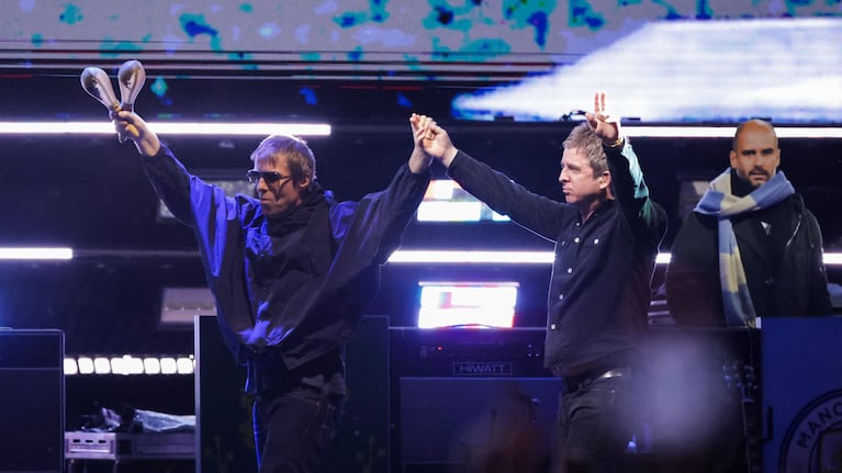 Liam Gallagher y Noel Gallagher en Oasis Live '25 Tour. Foto: REUTERS/Mario Anzuoni