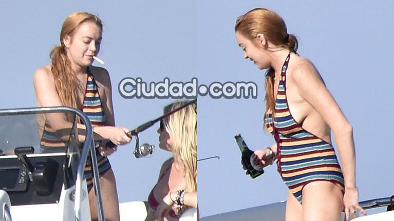 Lindsay Lohan, fumando y bebiendo alcohol en plena costa italiana. (Foto: Grosby Group)