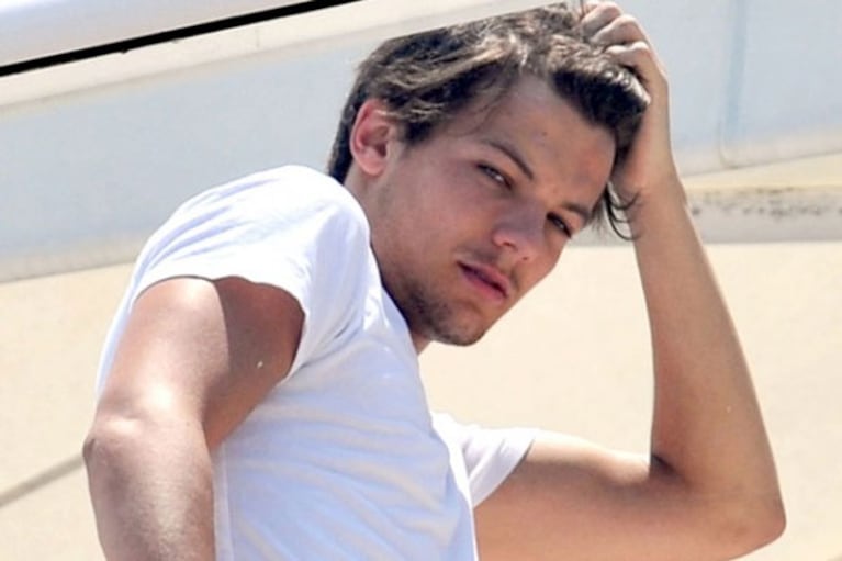 Louis Tomlinson cobra 425 dólares por una foto con él. (Foto: Web)