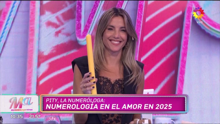María Belén Ludueña con el cirio de San Expedito. (Foto: eltrece)
