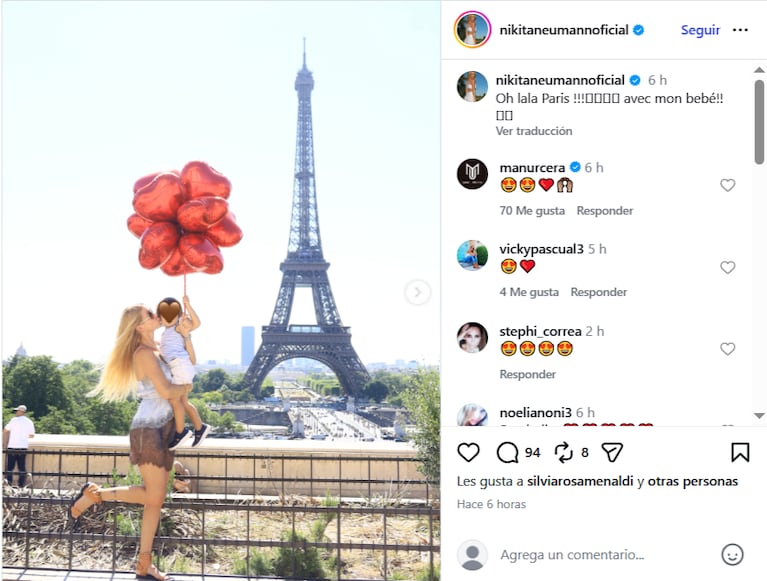 Nicole Neumann le da un beso a su hijo Cruz mientras lo sostiene en upa, con la Torre Eiffel de fondo. Fuente: Instagram @nikitaneumannoficial