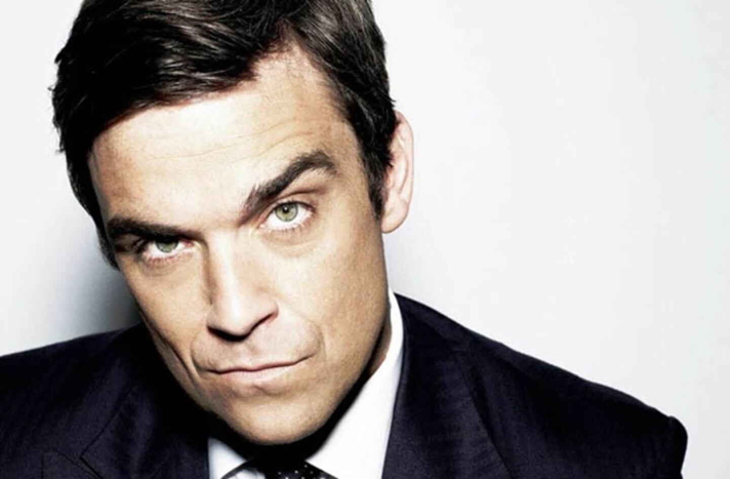 Robbie Williams debió pagar dos millones de dólares para poder abandonar Take That. (Foto: web)