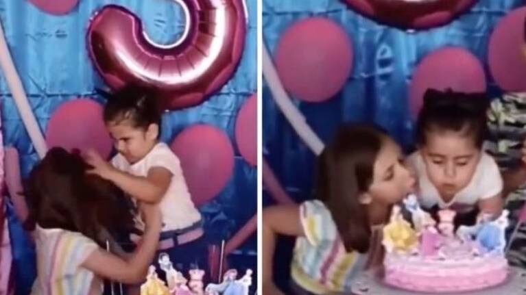 Se pelea con su hermanita por soplarle la vela de su torta de cumpleaños y es tendencia