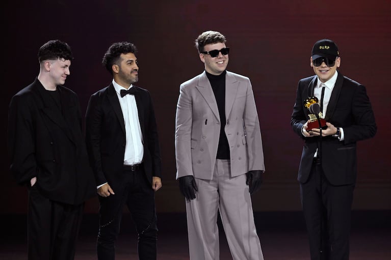 SEVILLE, SPAIN - NOVEMBER 16: (2-R) Quevedo and Bizarrap accept the award for Best urban song onstage during the Premiere Ceremony for The 24th Annual Latin Grammy Awards on November 16, 2023 in Seville, Spain. (Photo by Carlos Alvarez/Getty Images for Latin Recording Academy)