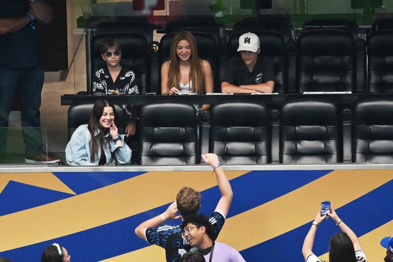 Singer Shakira, top center, and her sons, Milan, right, and Sasha, attend the World Cup Group J soccer match between Argentina and Austria in Arlington, Texas, near Dallas, Monday, June 22, 2026. (AP Photo/Jessica Tobias)