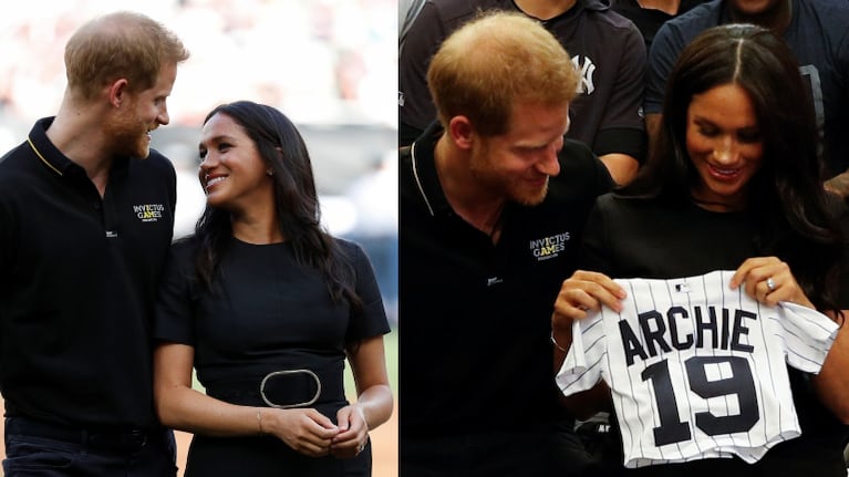 Sonrientes, los duques de Sussex asistieron a un partido de béisbol. Fotos: AFP.