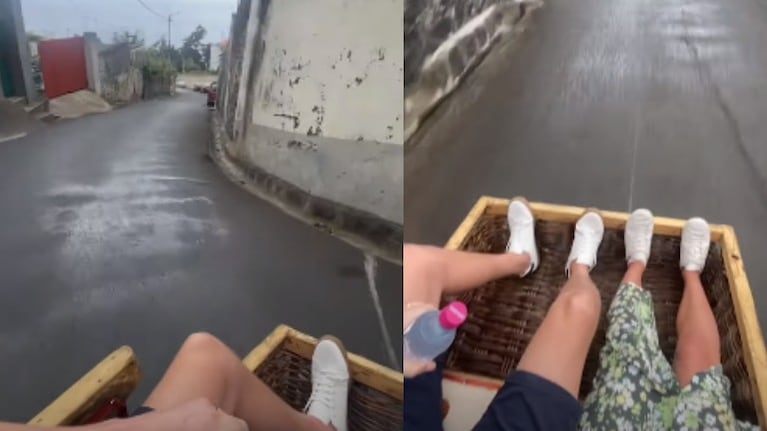 Turistas bajan en cestas de mimbre por las empinadas calles de Madeira