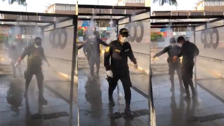 Usan una cabina de desinfección para evitar la propagación del coronavirus.