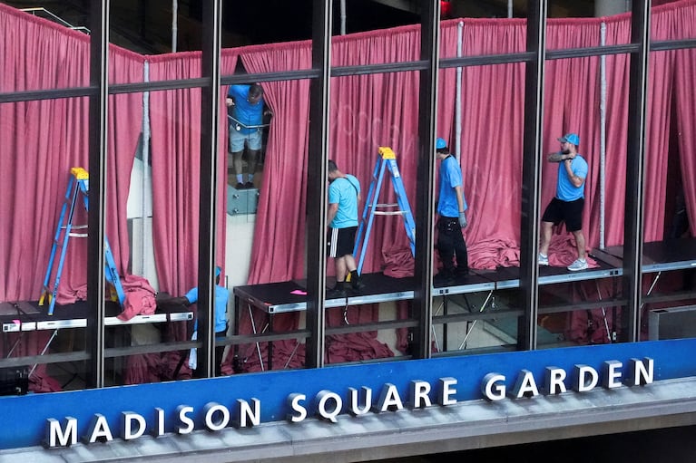 Workers set up courtains inside Madison Square Garden, the venue for the reported wedding celebrations of singer Taylor Swift and National Football League (NFL) player Travis Kelce, in New York, U.S., July 3, 2026. REUTERS/David Dee Delgado TPX IMAGES OF THE DAY